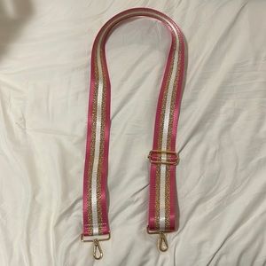 pink and gold bag strap